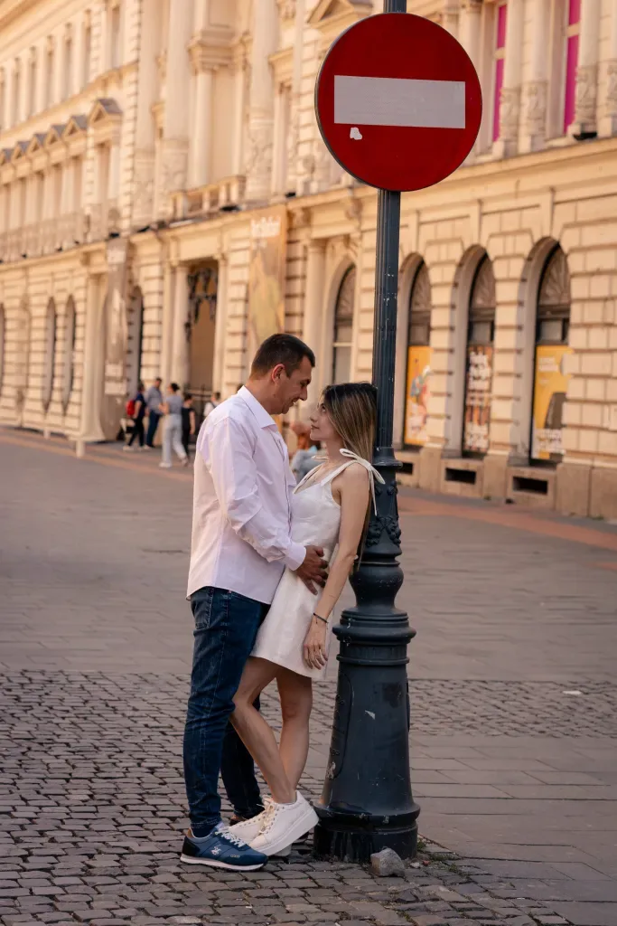 A couple during an engagement session on a street in Bucharest